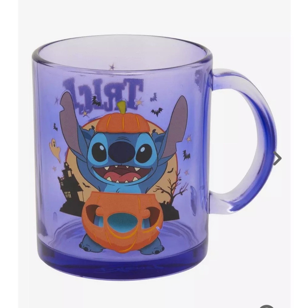 Disney glass mug, featuringStitch dressed  as a pumpkin new, never used
